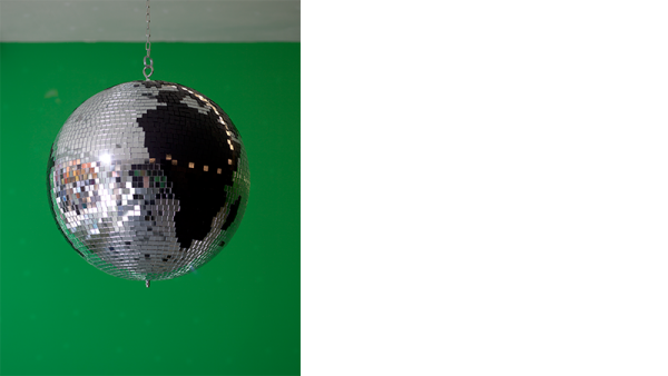 Disco Globe, Liz Magic Laser, 2013, mirrored glass, black glass, plastic core, chain and rotating motor, 16 x 16 x 16 in., edition of 5,&amp;nbsp;installation view, Paula Cooper Gallery, New York.