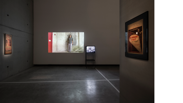 Prison Score, Liz Magic Laser, 2012, two-channel video and installation, 10 minutes, installation view, Contour 2013, Mechelen, Belgium. Photo: Kristof Vrancken.